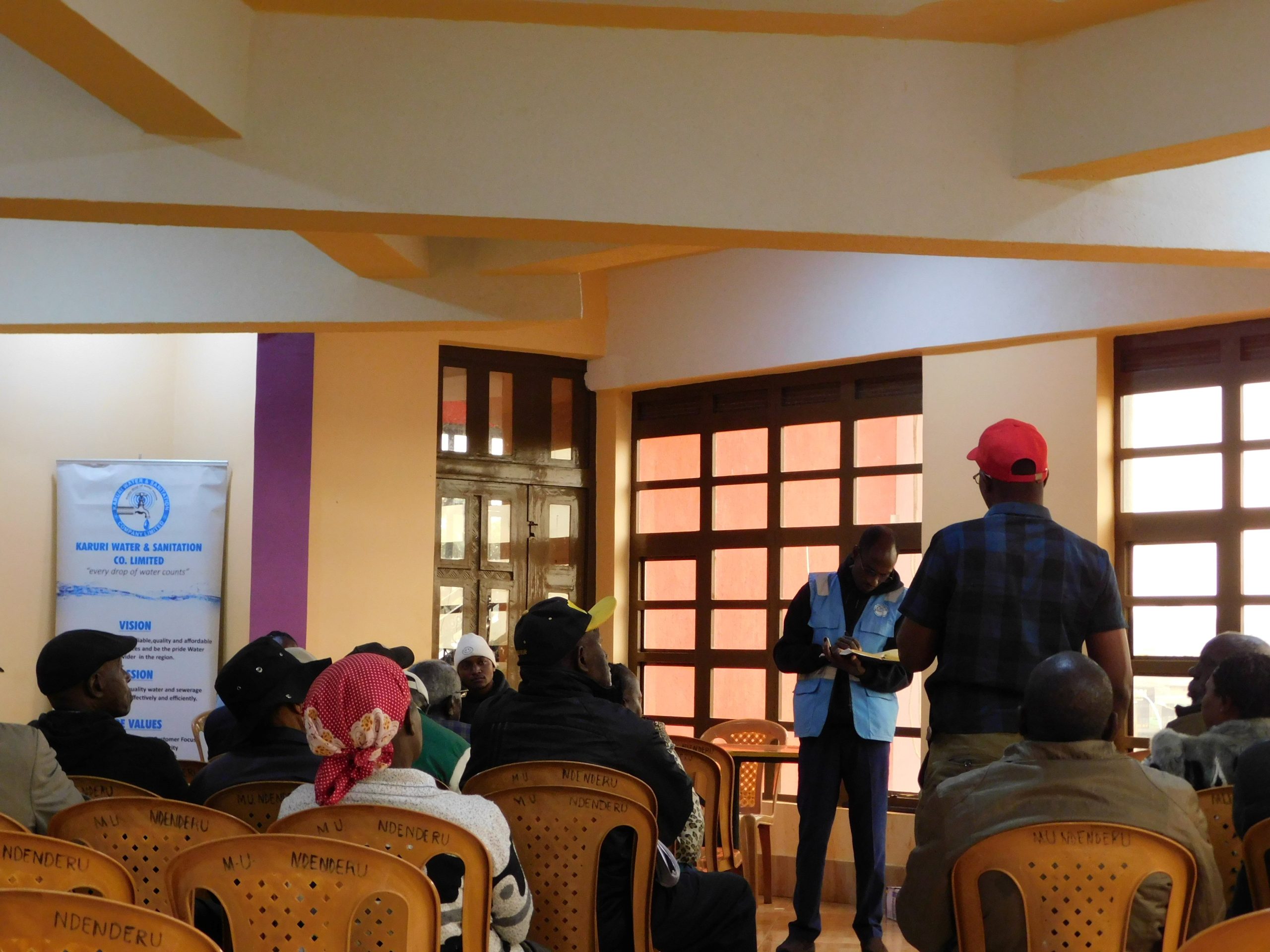 A customer asking a question during the interactive session at the KAWSCO clinic