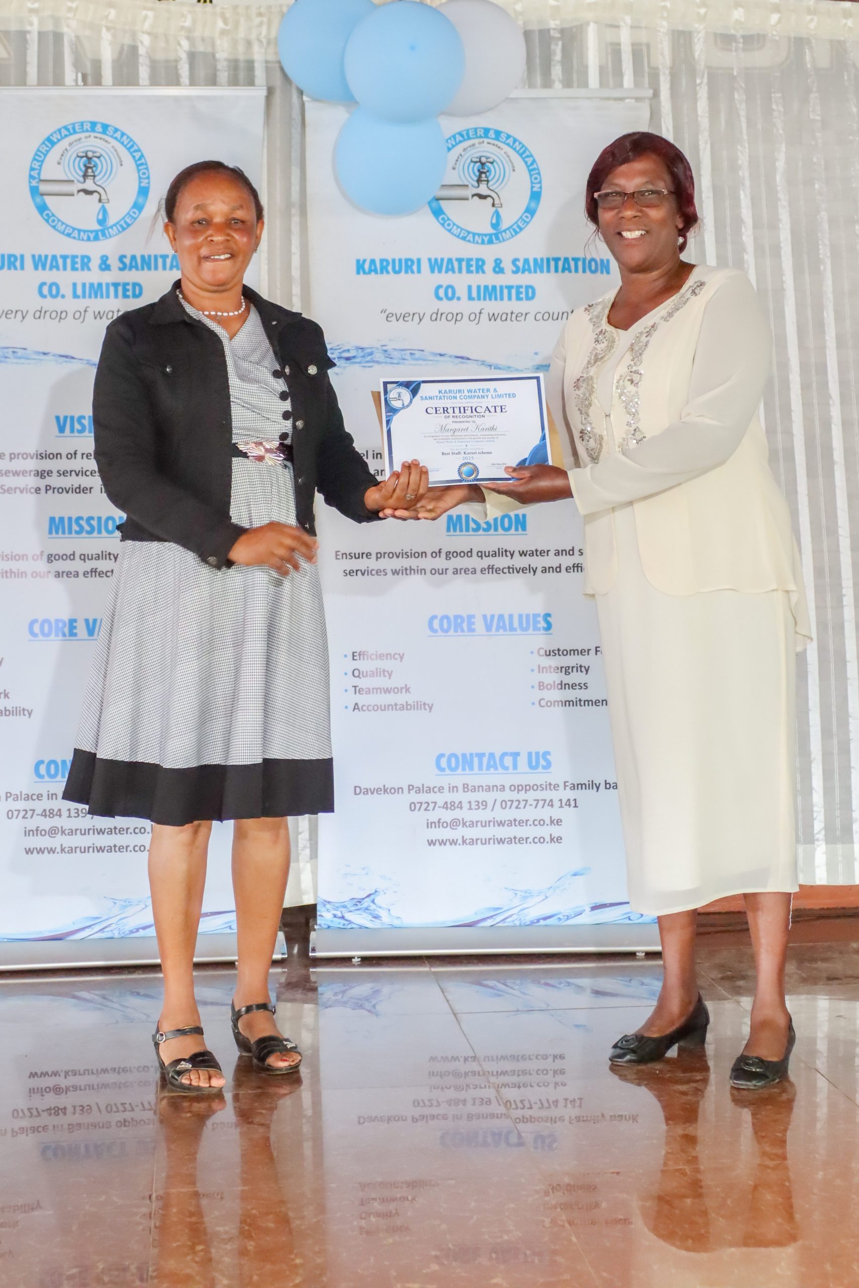 Best Scheme Staff awardees on stage