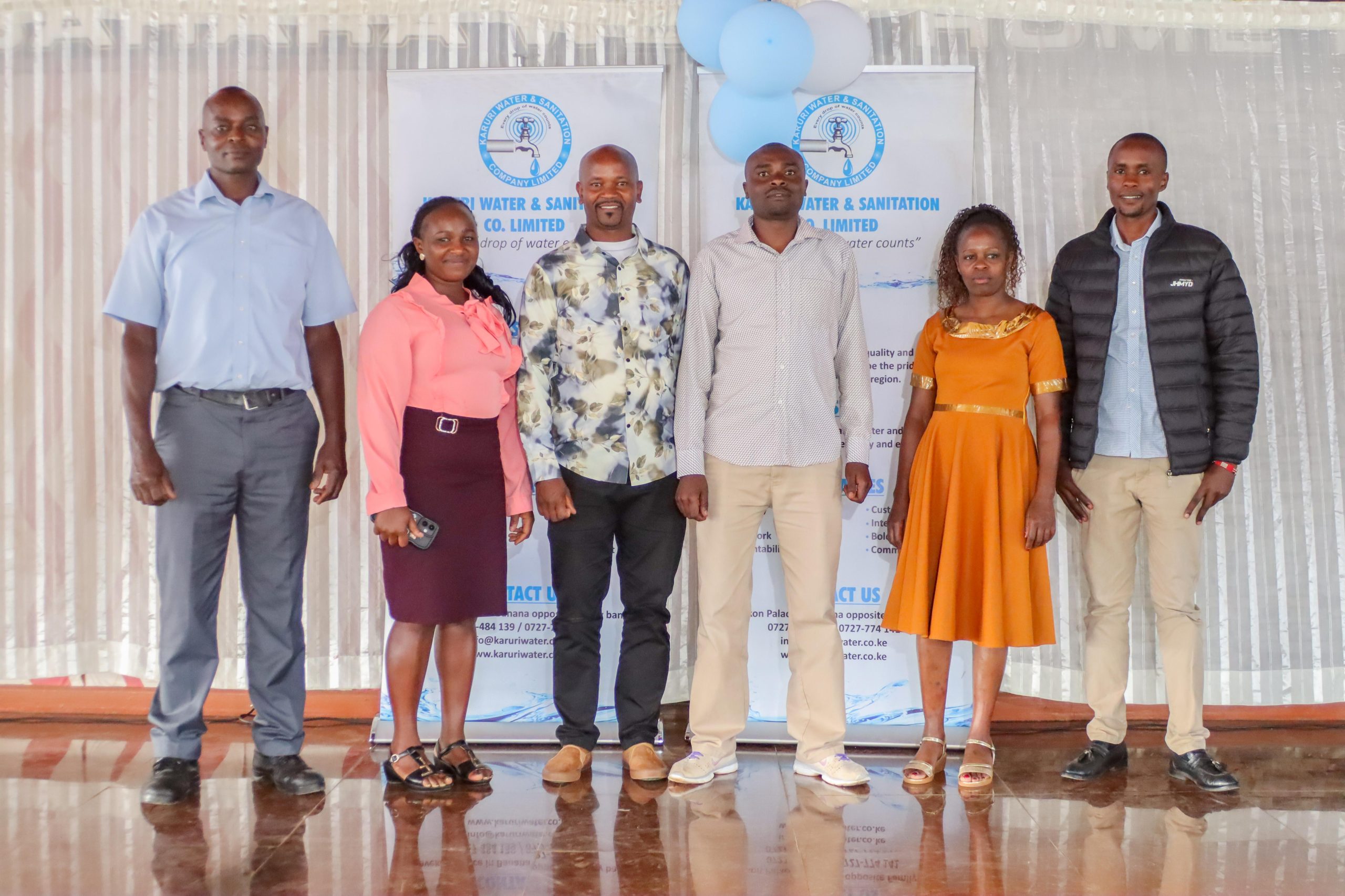 Best Scheme Staff awardees on stage